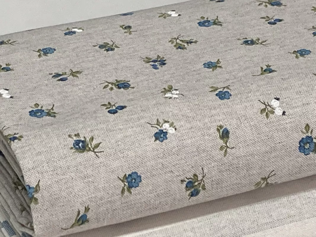 Dekorační látka- modré kvítí na režné dovoz EU